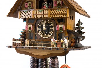 8-day Black Forest house cuckoo clock with visible clockwork, music and dancers