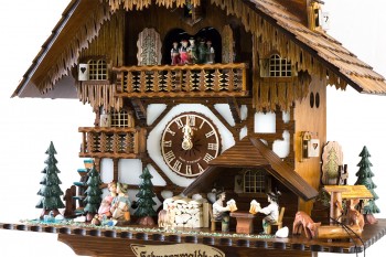 8-day Black Forest house style cuckoo clock with kissing couple, music and dancers