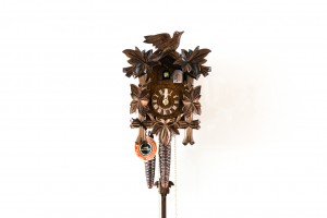 1-day carved cuckoo clock with bird and leaves